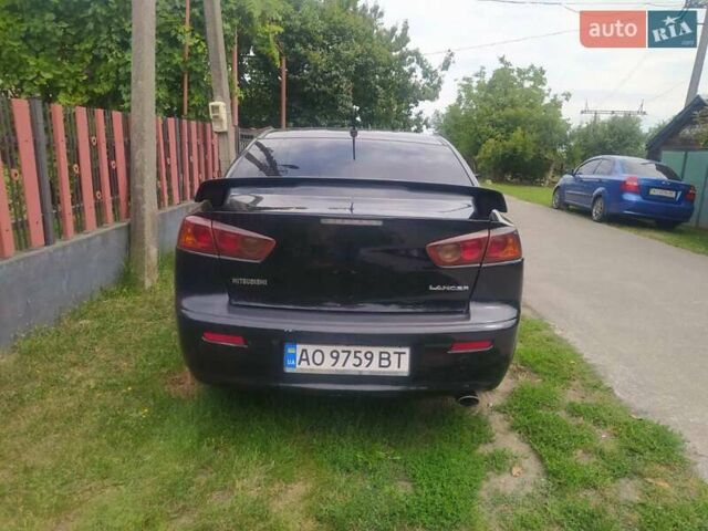 Чорний Міцубісі Lancer, об'ємом двигуна 2 л та пробігом 183 тис. км за 5000 $, фото 4 на Automoto.ua