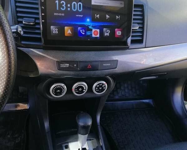 Мицубиси Лансер 2008 в Киеве на Automoto.ua Черный Мицубиси Лансер, объемом двигателя 2 л и пробегом 196 тыс. км за 5500 $, фото 11 на Automoto.ua