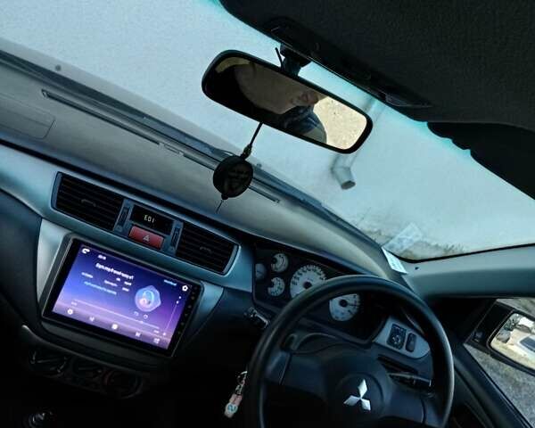 Мицубиси Лансер 2008 в Львове на Automoto.ua Черный Мицубиси Лансер, объемом двигателя 1.58 л и пробегом 200 тыс. км за 5200 $, фото 100 на Automoto.ua