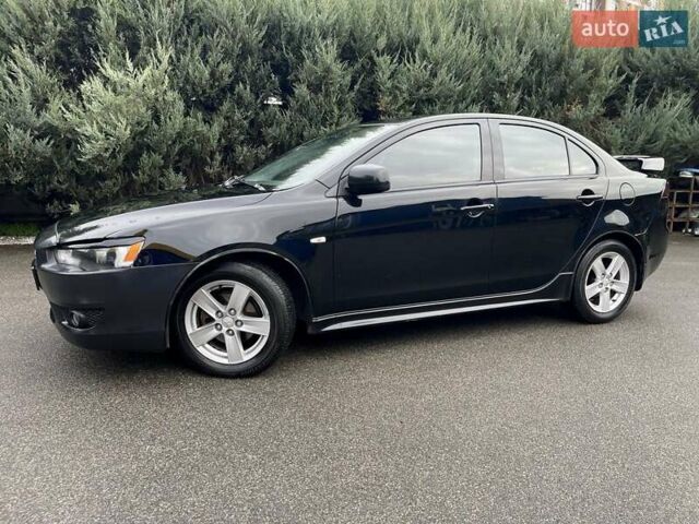 Чорний Міцубісі Lancer, об'ємом двигуна 2 л та пробігом 217 тис. км за 5600 $, фото 4 на Automoto.ua