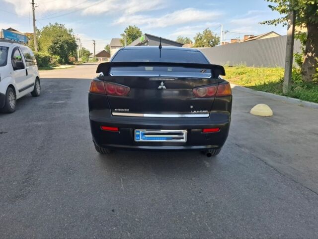 Чорний Міцубісі Lancer, об'ємом двигуна 2 л та пробігом 230 тис. км за 6650 $, фото 5 на Automoto.ua