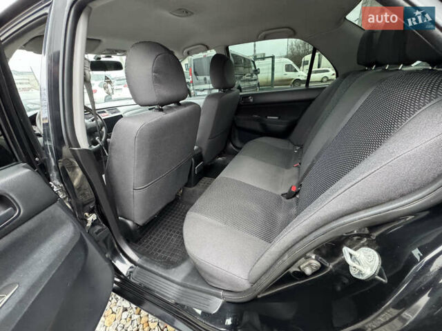 Черный Мицубиси Лансер, объемом двигателя 1.58 л и пробегом 202 тыс. км за 4100 $, фото 11 на Automoto.ua