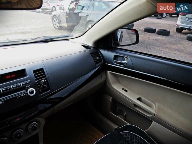 Мицубиси Лансер 2008 в Черкассах на Automoto.ua Черный Мицубиси Лансер, объемом двигателя 2 л и пробегом 178 тыс. км за 7400 $, фото 12 на Automoto.ua