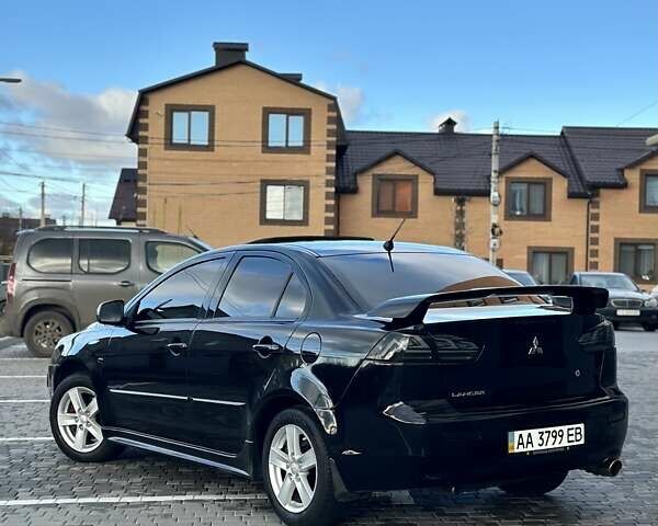 Черный Мицубиси Лансер, объемом двигателя 2 л и пробегом 150 тыс. км за 7850 $, фото 32 на Automoto.ua