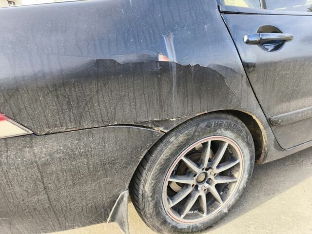 Черный Мицубиси Лансер, объемом двигателя 1.6 л и пробегом 358 тыс. км за 4300 $, фото 4 на Automoto.ua