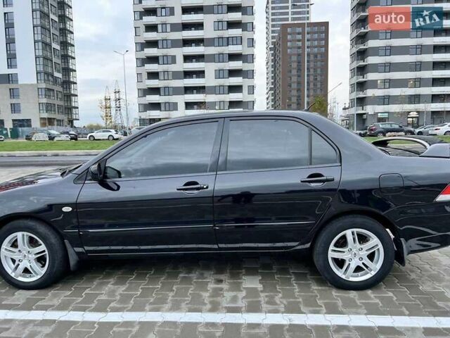 Чорний Міцубісі Lancer, об'ємом двигуна 1.6 л та пробігом 300 тис. км за 5500 $, фото 9 на Automoto.ua