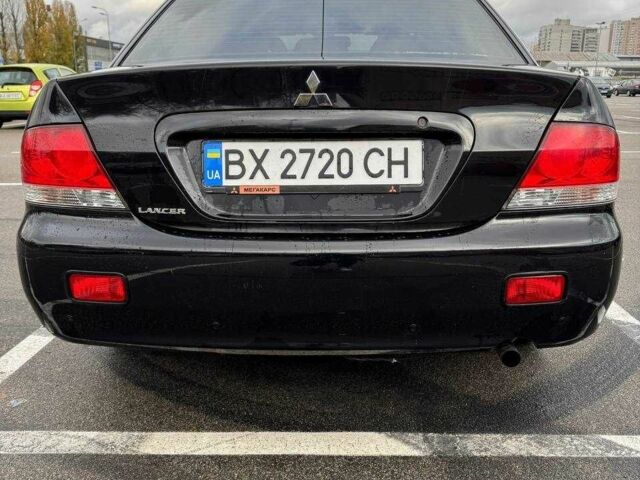 Чорний Міцубісі Lancer, об'ємом двигуна 1.6 л та пробігом 245 тис. км за 4500 $, фото 8 на Automoto.ua