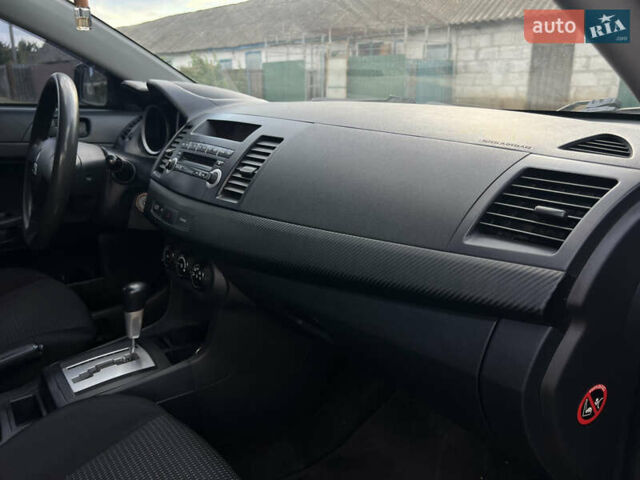 Чорний Міцубісі Lancer, об'ємом двигуна 1.5 л та пробігом 223 тис. км за 5699 $, фото 16 на Automoto.ua