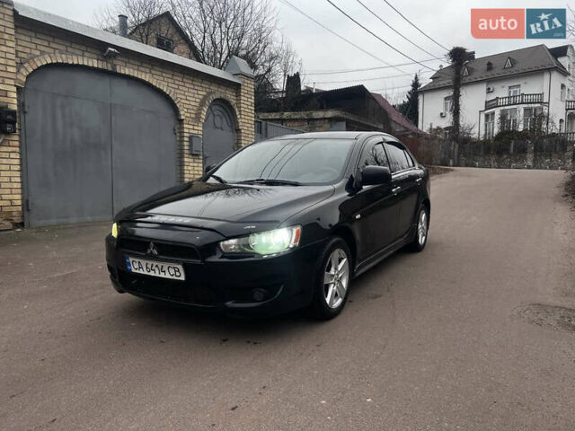 Черный Мицубиси Лансер, объемом двигателя 2 л и пробегом 192 тыс. км за 6300 $, фото 4 на Automoto.ua
