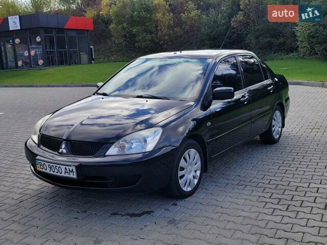 Міцубісі Lancer 2008 у Тернополі на Automoto.ua Чорний Міцубісі Lancer, об'ємом двигуна 1.58 л та пробігом 182 тис. км за 5600 $, фото 1 на Automoto.ua