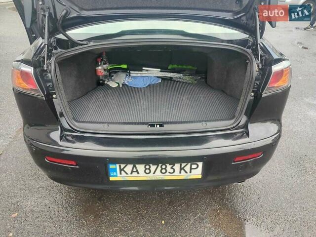 Черный Мицубиси Лансер, объемом двигателя 2 л и пробегом 229 тыс. км за 7300 $, фото 15 на Automoto.ua