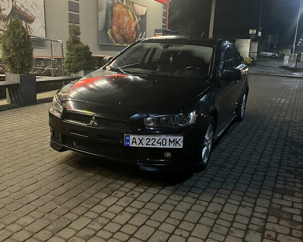 Черный Мицубиси Лансер, объемом двигателя 2 л и пробегом 270 тыс. км за 5400 $, фото 7 на Automoto.ua