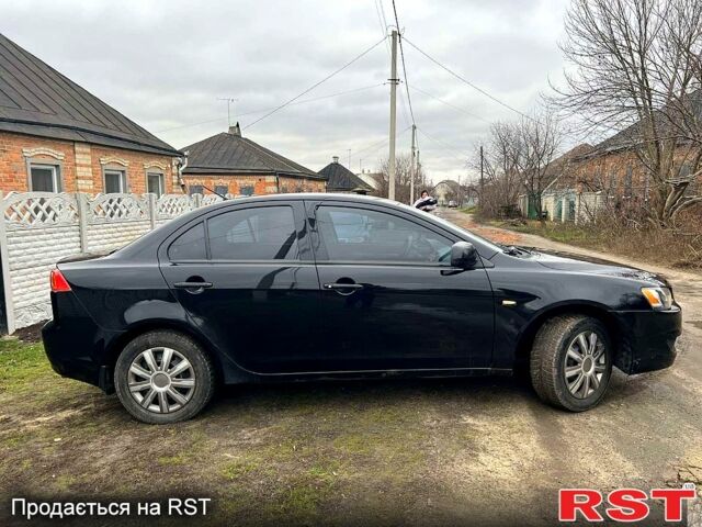 Чорний Міцубісі Lancer, об'ємом двигуна 1.5 л та пробігом 196 тис. км за 5900 $, фото 2 на Automoto.ua