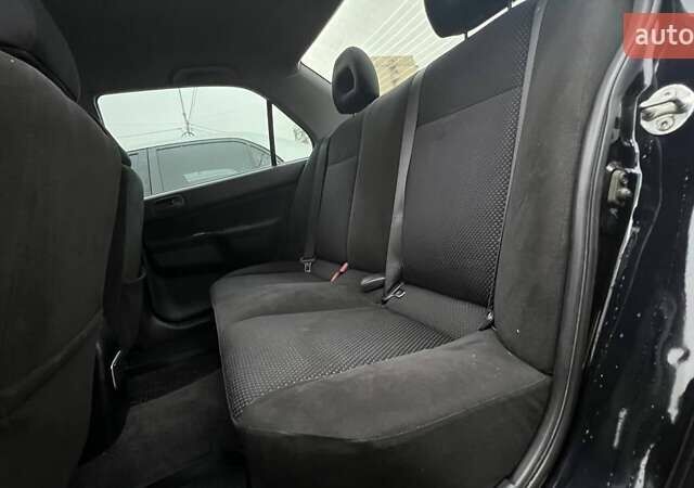 Чорний Міцубісі Lancer, об'ємом двигуна 1.6 л та пробігом 340 тис. км за 6190 $, фото 9 на Automoto.ua
