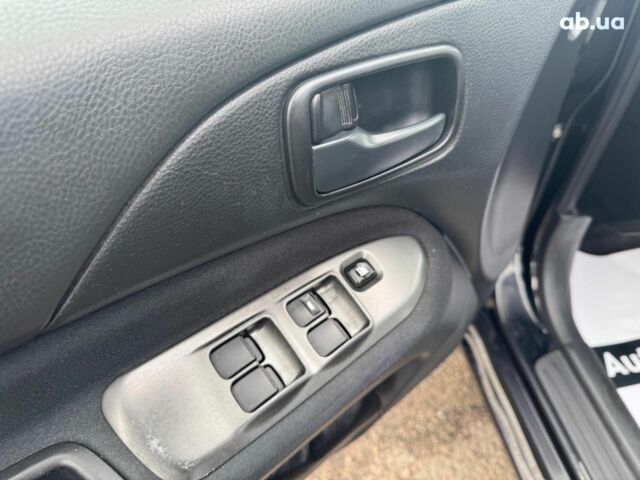 Мицубиси Лансер 2008 в Запорожье на Automoto.ua Черный Мицубиси Лансер, объемом двигателя 1.6 л и пробегом 316 тыс. км за 4290 $, фото 14 на Automoto.ua