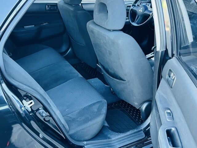 Міцубісі Lancer 2008 у Синельниковом на Automoto.ua Чорний Міцубісі Lancer, об'ємом двигуна 1.6 л та пробігом 230 тис. км за 4500 $, фото 15 на Automoto.ua