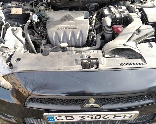 Черный Мицубиси Лансер, объемом двигателя 1.5 л и пробегом 219 тыс. км за 6000 $, фото 5 на Automoto.ua