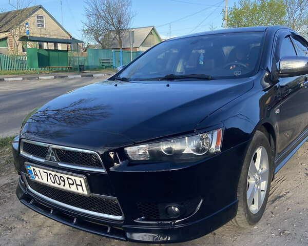 Чорний Міцубісі Lancer, об'ємом двигуна 2 л та пробігом 237 тис. км за 7599 $, фото 7 на Automoto.ua