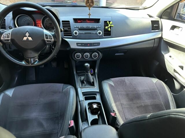 Чорний Міцубісі Lancer, об'ємом двигуна 2 л та пробігом 230 тис. км за 6650 $, фото 22 на Automoto.ua
