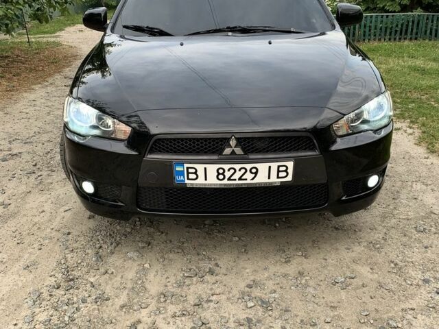 Чорний Міцубісі Lancer, об'ємом двигуна 2 л та пробігом 242 тис. км за 7000 $, фото 1 на Automoto.ua