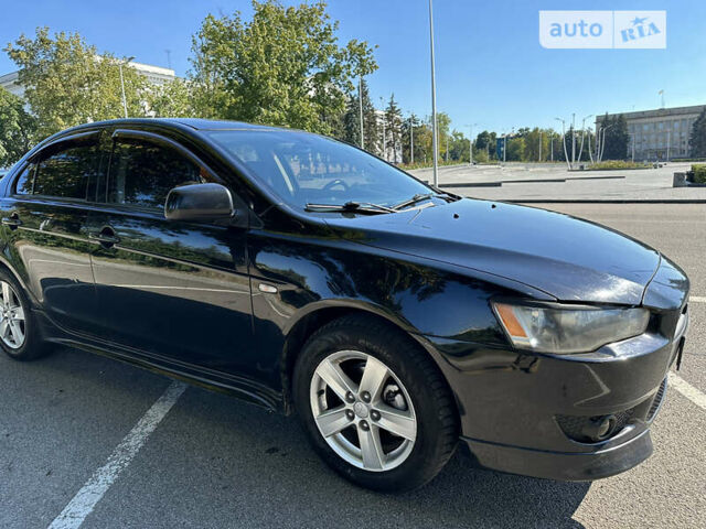 Чорний Міцубісі Lancer, об'ємом двигуна 2 л та пробігом 169 тис. км за 8200 $, фото 6 на Automoto.ua