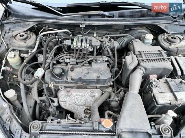 Чорний Міцубісі Lancer, об'ємом двигуна 1.6 л та пробігом 300 тис. км за 5500 $, фото 1 на Automoto.ua