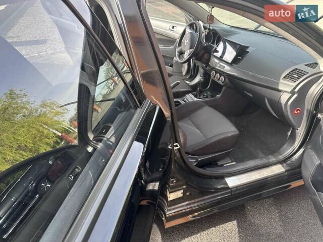 Чорний Міцубісі Lancer, об'ємом двигуна 2 л та пробігом 360 тис. км за 6900 $, фото 2 на Automoto.ua