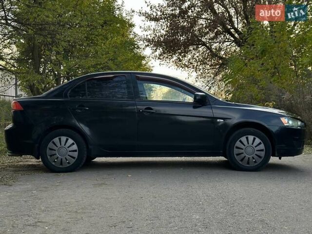 Черный Мицубиси Лансер, объемом двигателя 1.5 л и пробегом 285 тыс. км за 4800 $, фото 9 на Automoto.ua
