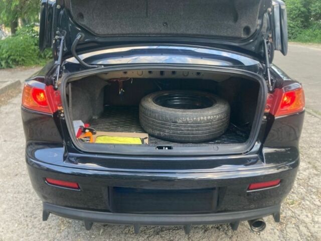 Черный Мицубиси Лансер, объемом двигателя 1.5 л и пробегом 217 тыс. км за 5700 $, фото 5 на Automoto.ua