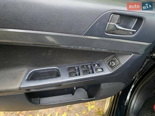 Чорний Міцубісі Lancer, об'ємом двигуна 2 л та пробігом 237 тис. км за 7500 $, фото 15 на Automoto.ua