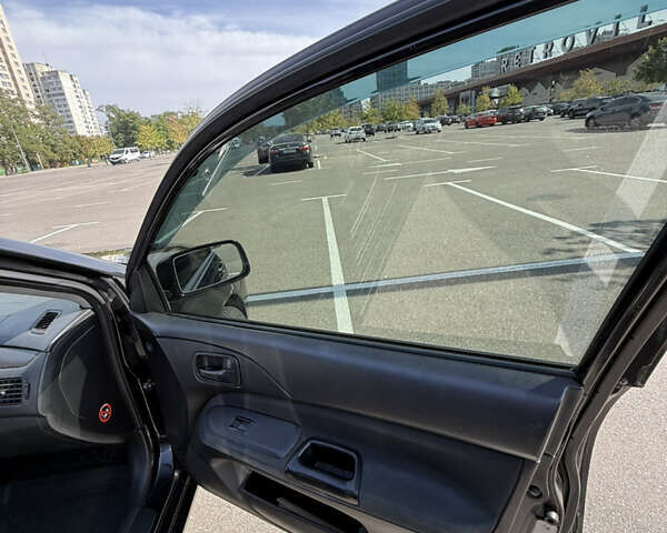 Черный Мицубиси Лансер, объемом двигателя 1.6 л и пробегом 321 тыс. км за 5000 $, фото 33 на Automoto.ua