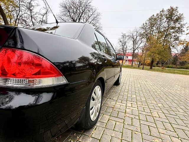 Черный Мицубиси Лансер, объемом двигателя 1.6 л и пробегом 185 тыс. км за 5500 $, фото 5 на Automoto.ua