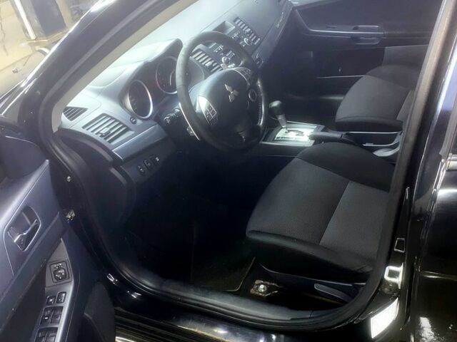 Чорний Міцубісі Lancer, об'ємом двигуна 2 л та пробігом 126 тис. км за 5800 $, фото 5 на Automoto.ua
