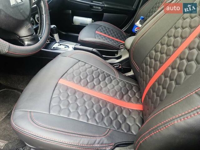 Чорний Міцубісі Lancer, об'ємом двигуна 2 л та пробігом 240 тис. км за 7850 $, фото 26 на Automoto.ua