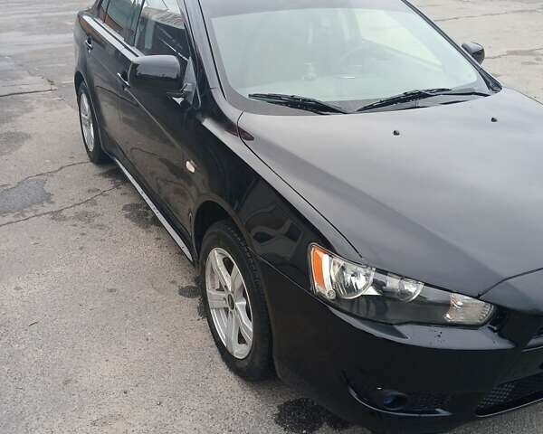 Черный Мицубиси Лансер, объемом двигателя 1.5 л и пробегом 253 тыс. км за 5500 $, фото 2 на Automoto.ua