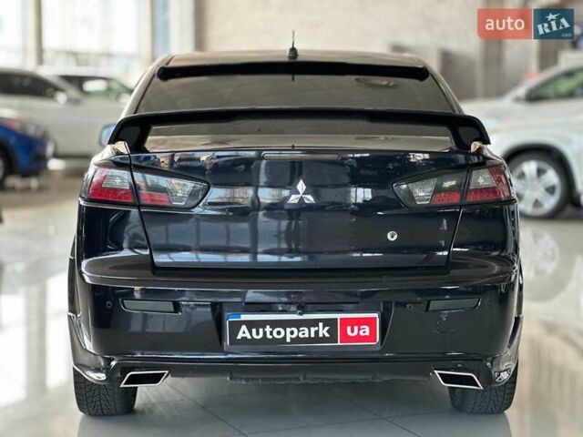 Чорний Міцубісі Lancer, об'ємом двигуна 2 л та пробігом 313 тис. км за 7690 $, фото 4 на Automoto.ua
