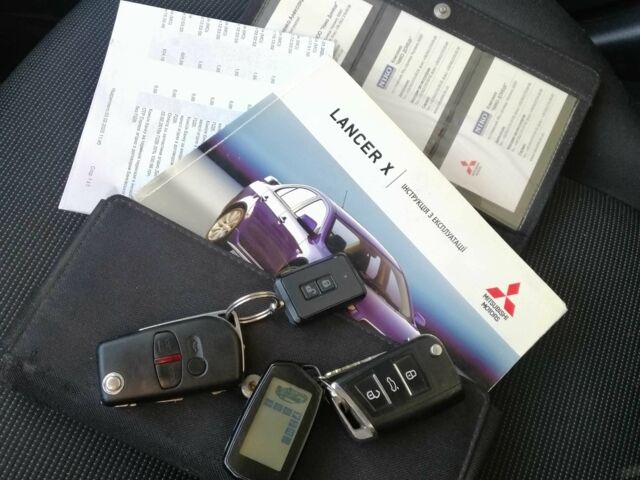 Міцубісі Lancer 2008 у Києві на Automoto.ua Чорний Міцубісі Lancer, об'ємом двигуна 2 л та пробігом 196 тис. км за 5500 $, фото 11 на Automoto.ua