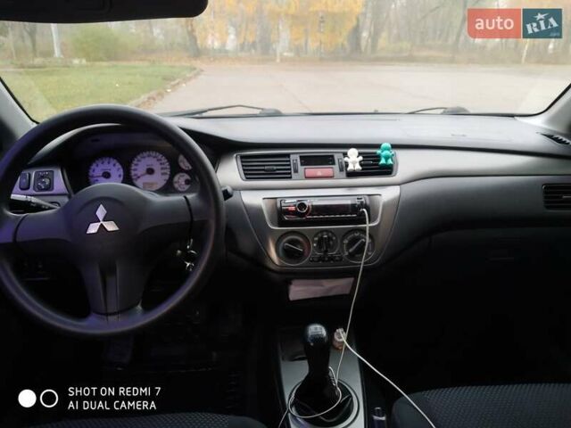 Мицубиси Лансер 2008 в Прилуках на Automoto.ua Черный Мицубиси Лансер, объемом двигателя 1.58 л и пробегом 219 тыс. км за 4900 $, фото 1 на Automoto.ua