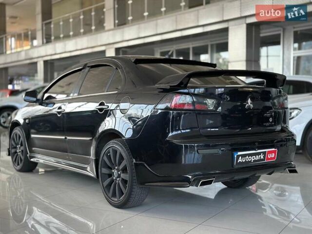 Чорний Міцубісі Lancer, об'ємом двигуна 2 л та пробігом 313 тис. км за 7690 $, фото 5 на Automoto.ua