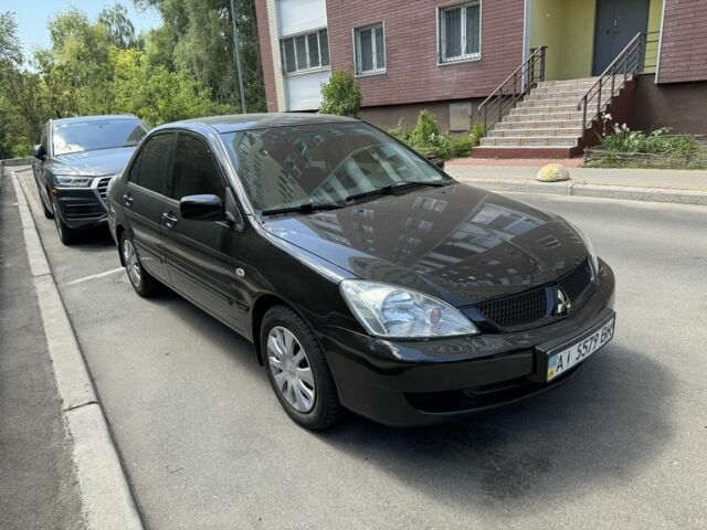 Чорний Міцубісі Lancer, об'ємом двигуна 1.6 л та пробігом 78 тис. км за 3999 $, фото 7 на Automoto.ua