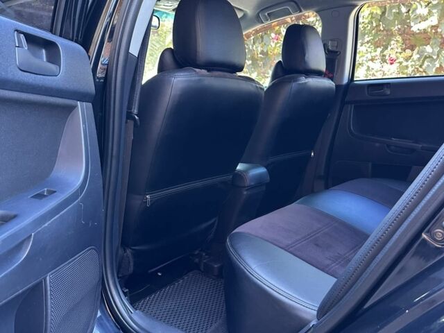 Чорний Міцубісі Lancer, об'ємом двигуна 2 л та пробігом 230 тис. км за 6650 $, фото 15 на Automoto.ua