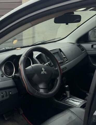 Чорний Міцубісі Lancer, об'ємом двигуна 1.5 л та пробігом 290 тис. км за 5499 $, фото 5 на Automoto.ua