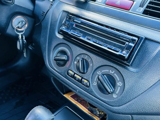Міцубісі Lancer 2008 у Синельниковом на Automoto.ua Чорний Міцубісі Lancer, об'ємом двигуна 1.6 л та пробігом 230 тис. км за 4500 $, фото 19 на Automoto.ua