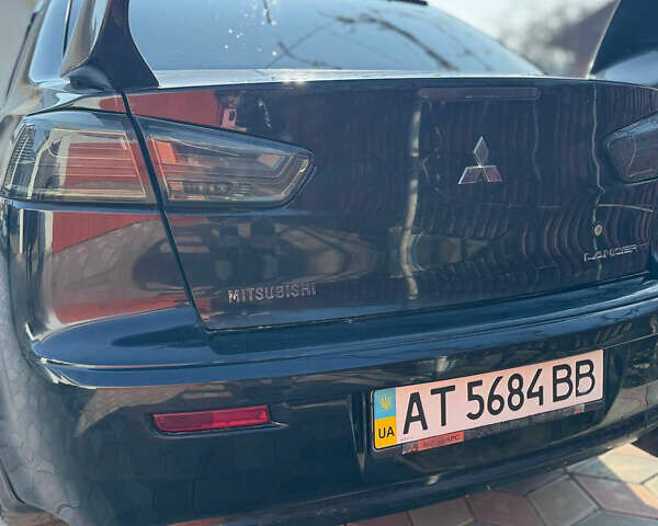 Чорний Міцубісі Lancer, об'ємом двигуна 2 л та пробігом 150 тис. км за 6500 $, фото 4 на Automoto.ua