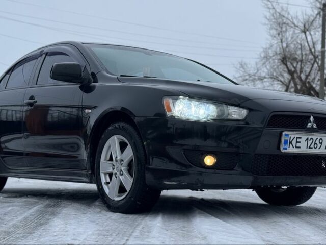 Черный Мицубиси Лансер, объемом двигателя 2 л и пробегом 280 тыс. км за 6800 $, фото 13 на Automoto.ua