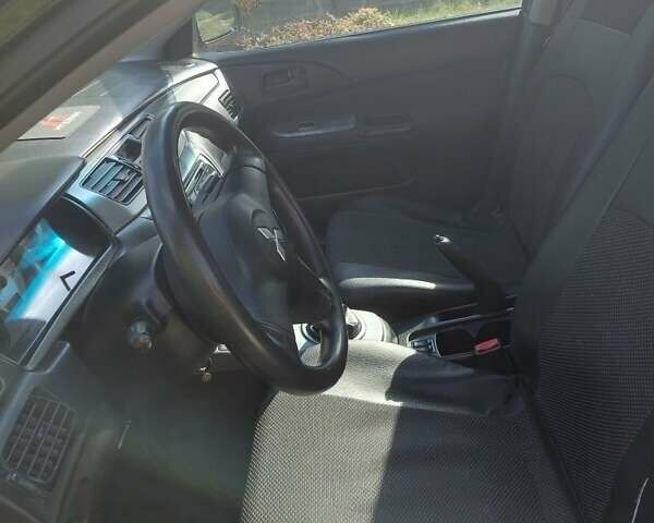 Чорний Міцубісі Lancer, об'ємом двигуна 1.6 л та пробігом 221 тис. км за 5200 $, фото 3 на Automoto.ua