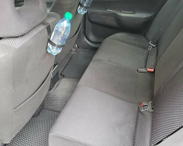 Чорний Міцубісі Lancer, об'ємом двигуна 1.58 л та пробігом 334 тис. км за 4750 $, фото 2 на Automoto.ua