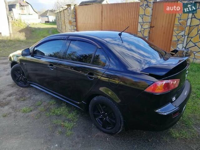 Мицубиси Лансер 2008 в Киеве на Automoto.ua Черный Мицубиси Лансер, объемом двигателя 2 л и пробегом 196 тыс. км за 5500 $, фото 2 на Automoto.ua