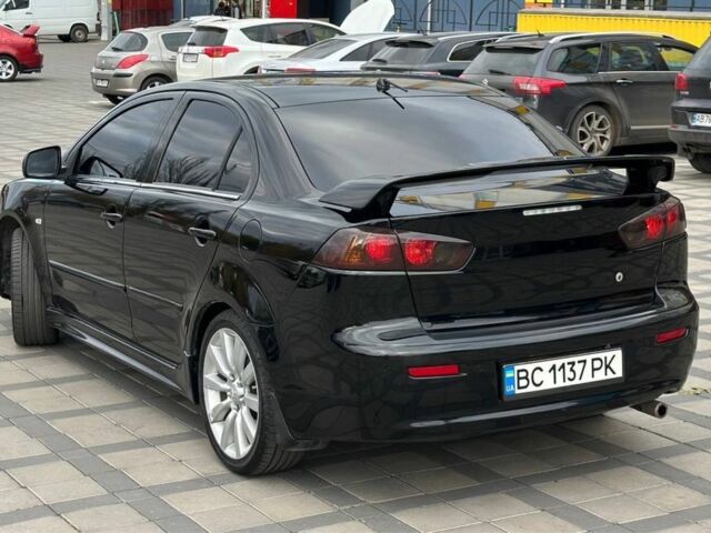Чорний Міцубісі Lancer, об'ємом двигуна 2 л та пробігом 236 тис. км за 7900 $, фото 2 на Automoto.ua