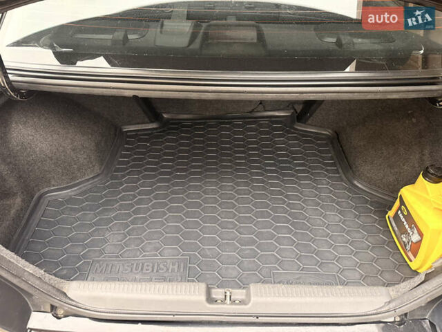 Чорний Міцубісі Lancer, об'ємом двигуна 1.6 л та пробігом 265 тис. км за 4700 $, фото 23 на Automoto.ua